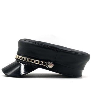 Women's black faux leather newsboy cap with gold metal chain and polished visor