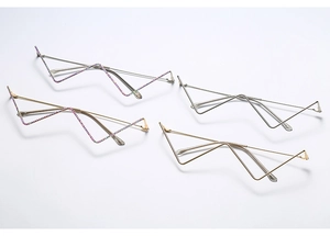 Detailed view of geometric semi-rimless metal eyewear frames with rhinestone accents