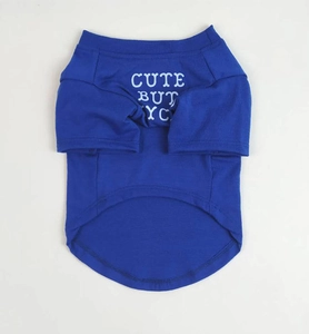 Close-up of blue cotton pet T-shirt with white CUTE BUT CYC printed text on the back