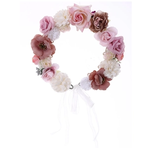 Floral crown with colorful artificial roses and white ribbons on a clean white background