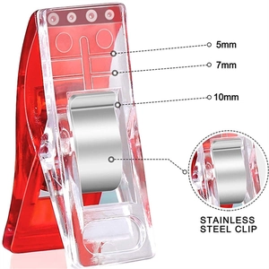 Detailed view of red heart clip showing dimensions and stainless steel spring mechanism