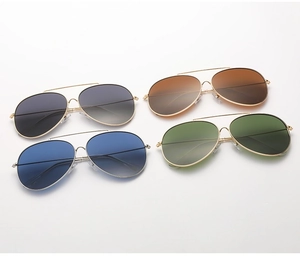 Classic aviator sunglasses with gold metal frames and four lens color variations