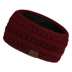 Detail of red knit headband with textured yarn and brown MOK leather logo patch