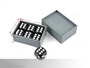 Detailed view of six black magic dice in a 6cm by 4cm grey storage box with dimensions