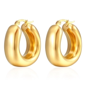 Detail of 18K gold plated thick chunky hollow hoop earrings with secure snap closure