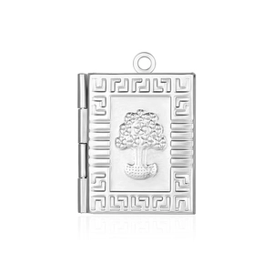 Macro detail of silver book-shaped locket pendant with tree relief and greek key pattern