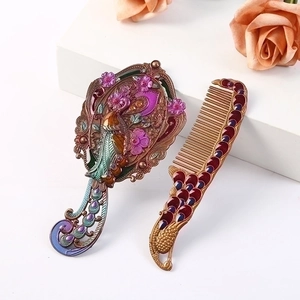 Vintage peacock handheld mirror and comb set with colorful enamel and crystals