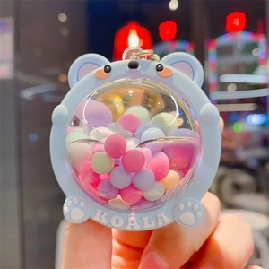 Blue koala acrylic keychain with colorful macabre beads and clear dome design