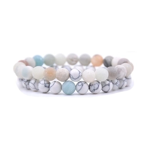Close-up of double-layered beaded bracelet with matte natural stone beads in mixed colors