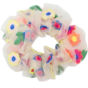 Sheer beige organza scrunchie with colorful floral embroidery on a white background