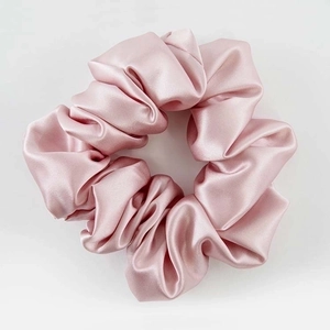 3.5cm premium pink mulberry silk scrunchie with smooth glossy texture on white background