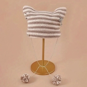 Berretto in maglia a righe con orecchie da gatto, pompon e croce punk beige e marrone