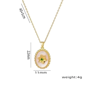 Vintage 18K gold-plated necklace with white shell oval pendant and green flower gem