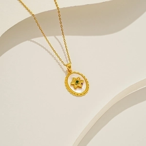 18K gold plated necklace with white mother of pearl oval pendant and green flower gem