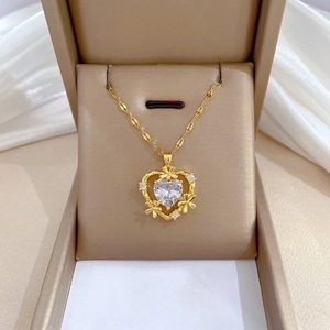 Elegant gold titanium steel heart pendant necklace with zircon and floral accents