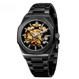 Detail of hollow automatic mechanical watch with gold gears and black steel octagonal bezel