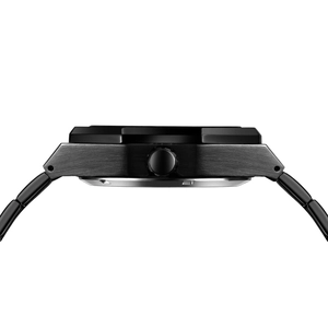 Macro side view of black stainless steel watch case with crown and brushed metal finish