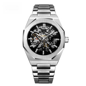 Detailed macro of silver octagonal bezel and intricate hollow mechanical movement