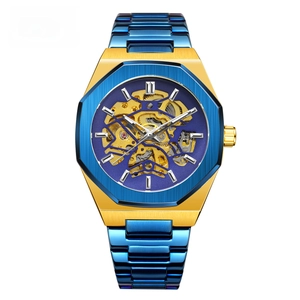 Macro shot of mechanical watch skeleton dial with golden gears and octagonal blue bezel