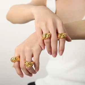 Polished gold-plated titanium steel chunky twisted rope rings set for a modern minimalist look
