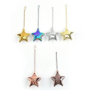Star-shaped stainless steel tea infusers with hanging chains in multiple metallic colors