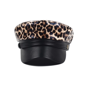 Leopard print newsboy cap with black leather visor and metal button detail