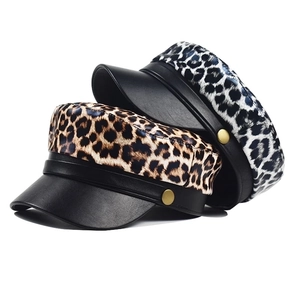 Leopard print PU leather baker boy hats in brown and blue with gold metal buttons