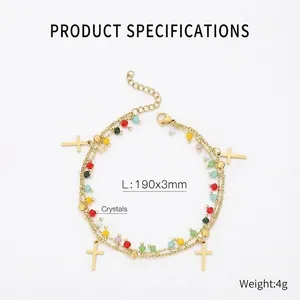 Detailed parameter view of gold layered bracelet with cross pendants and colorful beads
