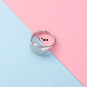 Detail shot of a silver oval stainless steel ring showing the 17mm inner diameter size