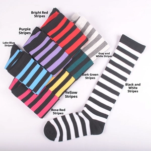 Detailed flat lay of colorful striped knee-high socks in eight vibrant color options