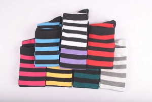 Detailed view of colorful striped knee-high cotton socks in multiple color combinations