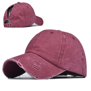 Burgundy washed cotton ponytail baseball cap with vintage distressed details and adjustable buckle