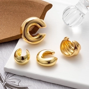 Polished gold ear cuff set with smooth and ribbed designs for non-pierced ears