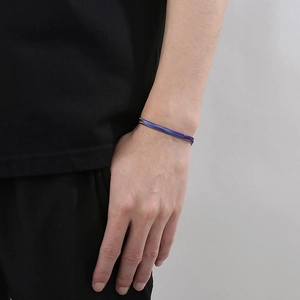 Detail of 5mm purple and blue gradient flat snake bone chain bracelet on wrist
