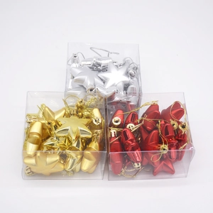 Three-dimensional Christmas star ornaments in red, gold and silver metallic finishes