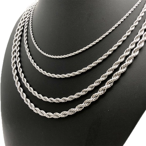Multiple silver stainless steel twist chains on neck bust showing various lengths