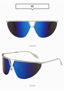 Close-up of futuristic rimless silver metal frame sunglasses with blue mirror lenses