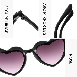 Detail view of heart-shaped sunglasses featuring secure hinges and ergonomic temple tips