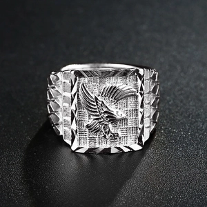 Silver eagle relief ring for men with vintage engraved wings and geometric metal patterns