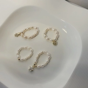 Baroque freshwater pearl beaded rings set with bear, star, and heart charms for women