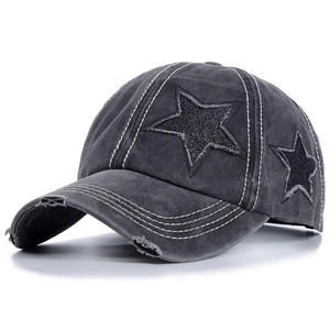Washed cotton baseball cap with distressed brim and sequined star patches on side