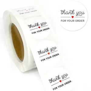 Roll of white circular Thank You stickers with red hearts for gift sealing, 1 inch size