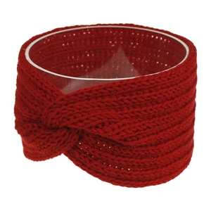 Detail of red knitted headband showing thick yarn texture and stylish central twist knot