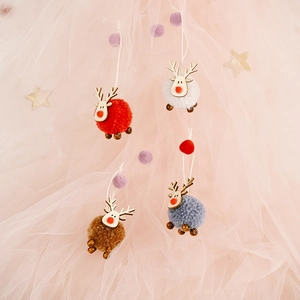 Felt reindeer Christmas tree ornaments in red white brown and grey with wooden accents