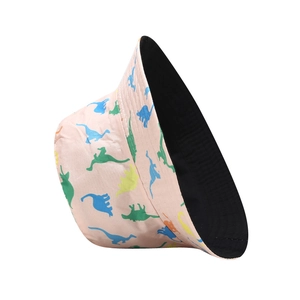 Pink reversible bucket hat with dinosaur print and black lining for sun protection