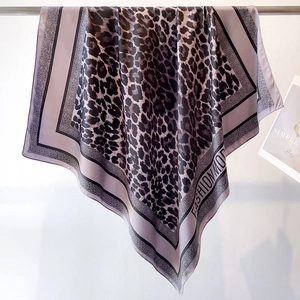 Fashionable leopard print silk scarf with black border and smooth satin finish
