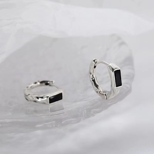 Minimalist silver hoop earring for men featuring a rectangular black stone inlay
