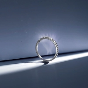 Close-up of S925 sterling silver band with fine pave-set cubic zirconia stones