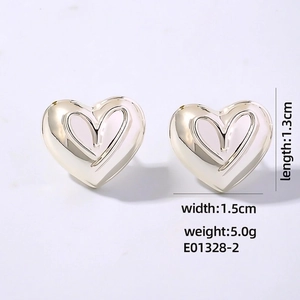 Detailed size view of silver hollow heart earrings showing dimensions 1.3cm by 1.5cm