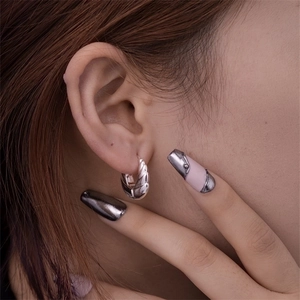 Polished silver geometric croissant earrings with hollow minimalist texture design